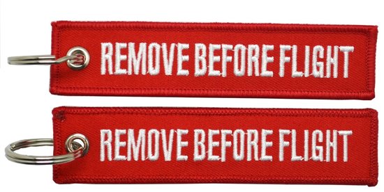 Keyholder with REMOVE BEFORE FLIGHT on both sides, red background 